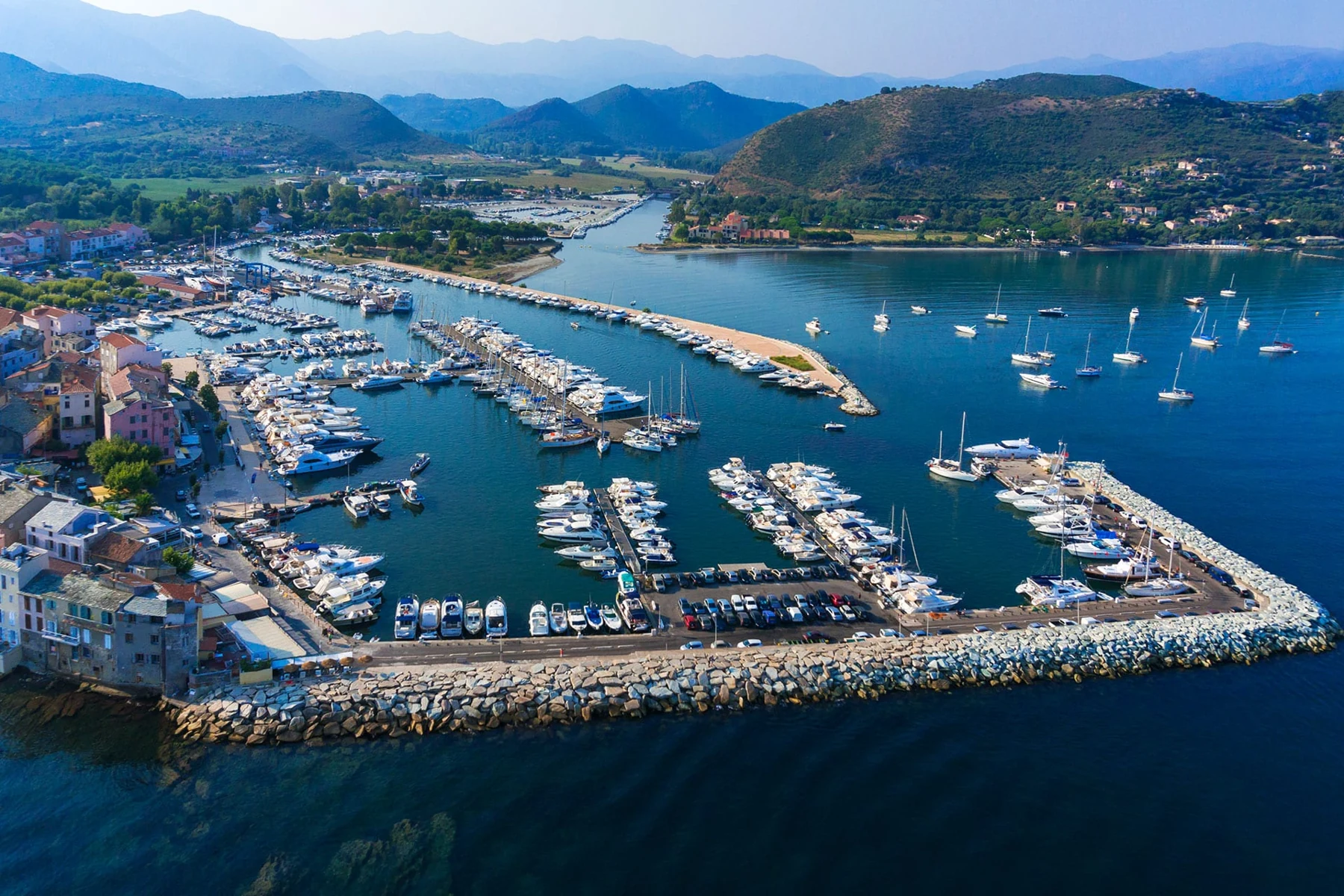 Saint-Florent marina and the Corsican hills seen from above